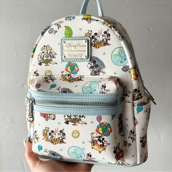 Loungefly Handbags - *SOLD* Mickey & Minnie’s Runaway Railway Loungefly Mini Backpack